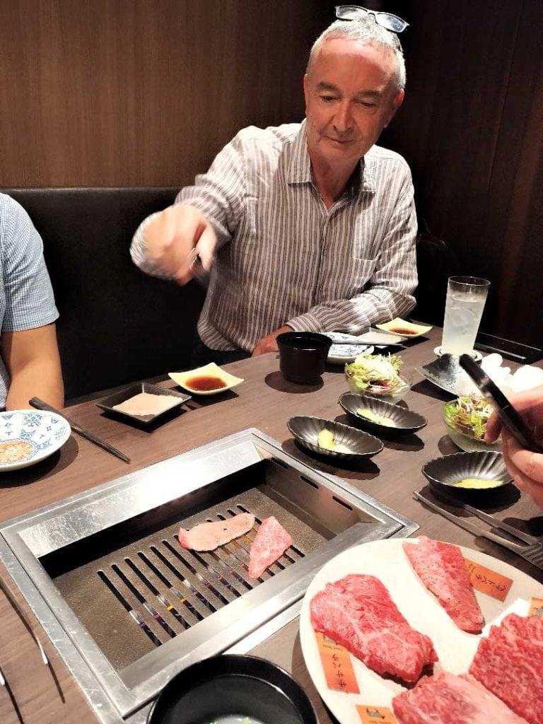 Wagyu on the grill during Shinjuku food tour