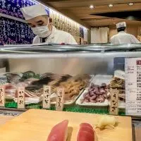 Two types of tuna nigiri sushi at standing sushi bar in Shibuy